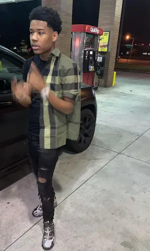Nardo Wick wearing Burberry shirt