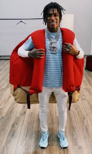 NLE Choppa wearing Fantomaz backpack