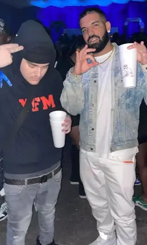 Drake wearing Jordan sneakers