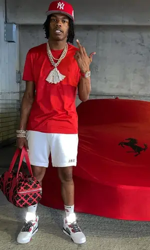 Lil Baby wearing Chrome Hearts sock
