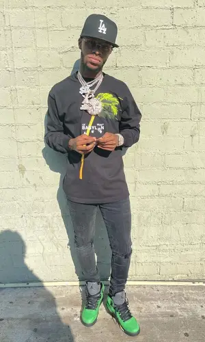Toosii wearing Cartier eyewear