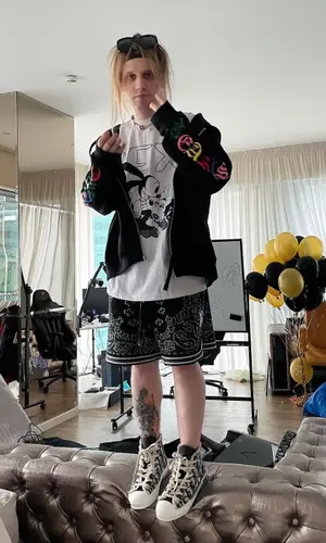PLOHOYPAREN wearing Dior sneakers