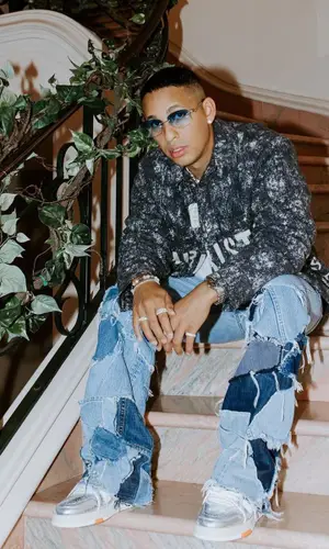 Rvssian wearing Dior shirt