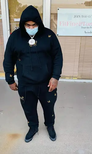 Big Yavo wearing Felt hoody