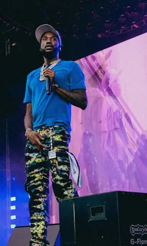 Meek Mill wearing Paper Planes scarf