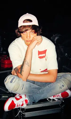 OG Buda wearing Rhude t-shirt
