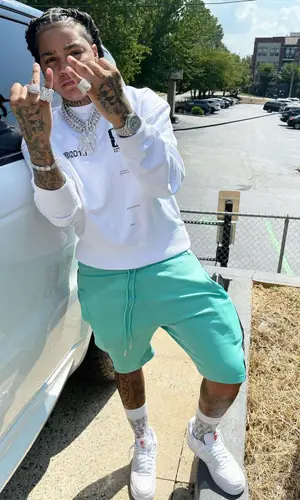 Young M.A’s Outfit in Off-White Sweatshirt, Nike Sneakers & Dior Socks (2021)