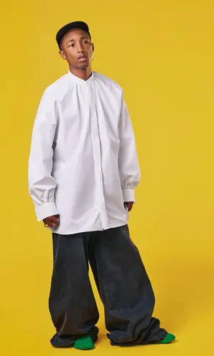 Pharrell Williams wearing Raf Simons jeans