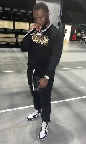 Headie One wearing Amiri sweatshirt