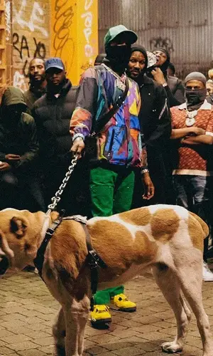 Meek Mill wearing Sacai jacket