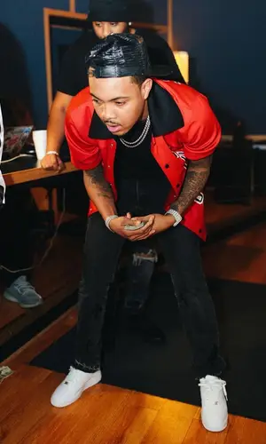 G Herbo wearing Mitchell & Ness shirt
