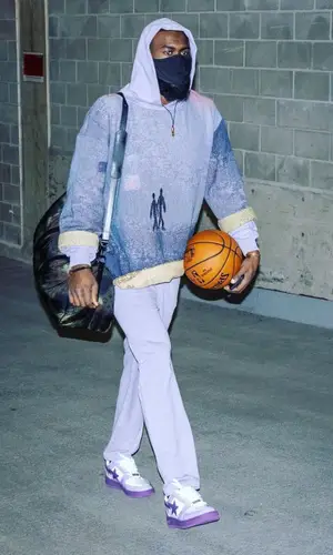 Jaylen Brown wearing Louis Vuitton bag