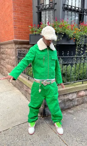 Bloody Osiris wearing Louis Vuitton sneakers