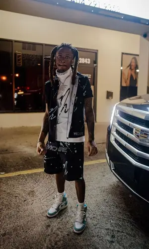 Slimelife Shawty wearing Vicaire t-shirt