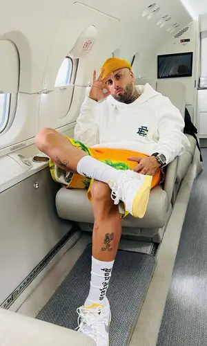 Nicky Jam wearing Palm Angels sock