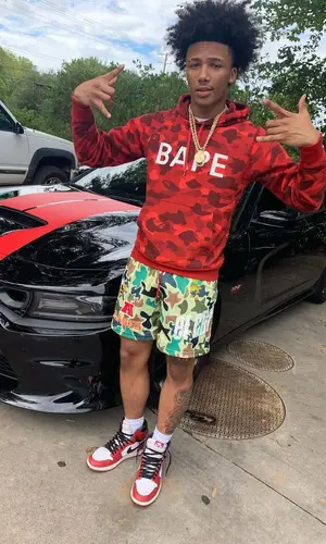 Mikey wearing El Capitan Cartel shorts