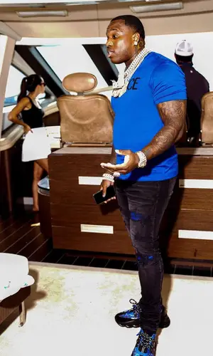BandMan Kevo’s Outfit in Versace T-Shirt & Amiri Jeans (2021)