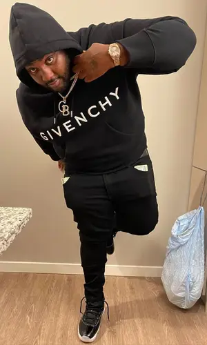 Peezy wearing Givenchy hoody
