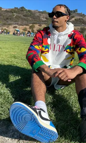 Amari Bailey wearing Valentino shorts