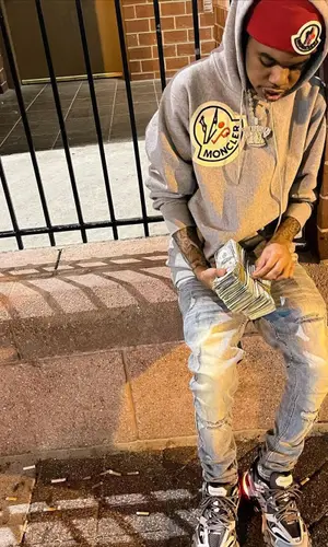 Lil Poppa wearing Moncler hoody