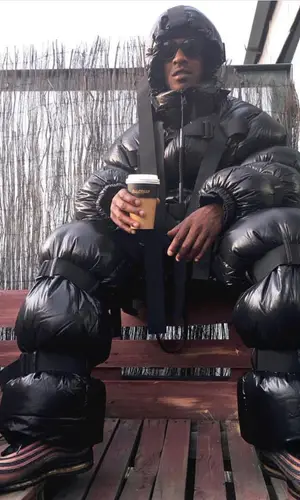 Skepta wearing Moncler jacket