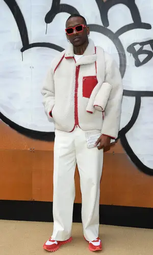 Skepta wearing Louis Vuitton jacket