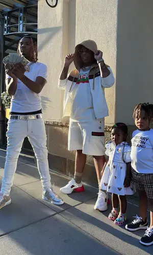Lil Gotit wearing Gucci sweatshirt