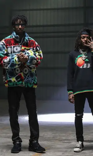 J.I.D wearing Casablanca sweater