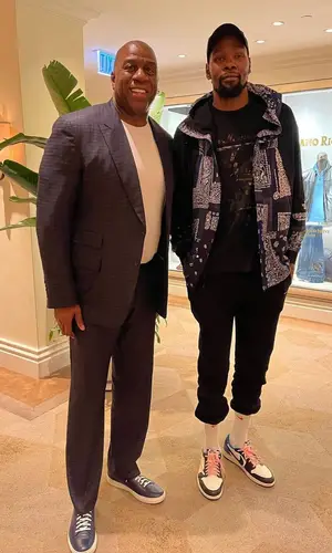 Kevin Durant’s Outfit in Readymade Jacket, Travis Scott Merch Sneakers & Nike Socks (2021)