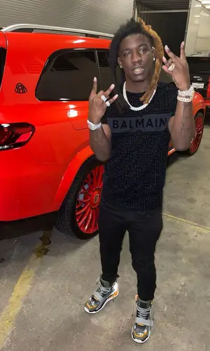 Hot Boii wearing Balmain jeans