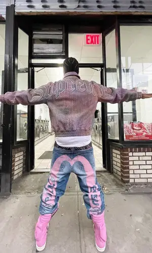 Bloody Osiris wearing Palace jeans