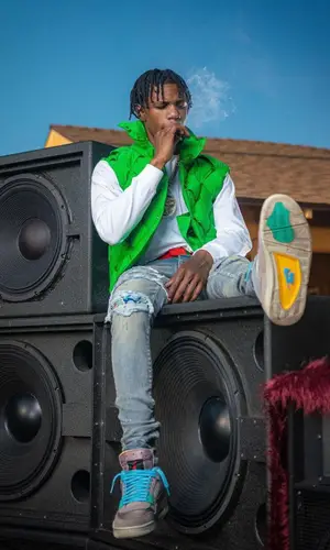 A Boogie Wit Da Hoodie wearing Bottega Veneta belt