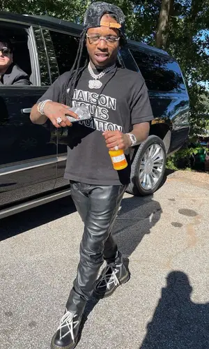 Jacquees wearing Rick Owens boots