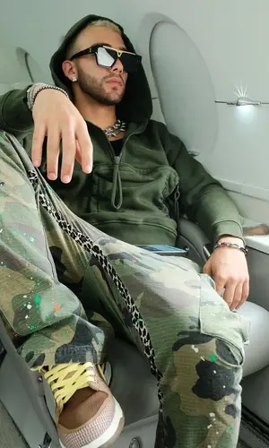 Manuel Turizo’s Outfit in Gallery Dept. Pants, Nike Sneakers & Louis Vuitton Eyewear (2021)