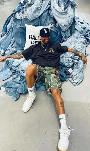 Nicky Jam wearing Gallery Dept. sock
