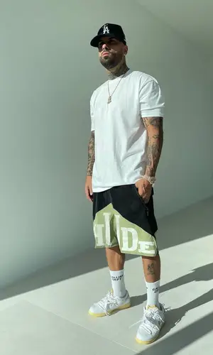 Nicky Jam wearing The Hat Dealers cap