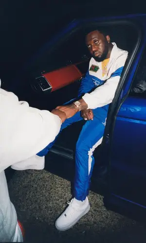 Headie One wearing OVO jacket