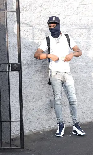 Lil Keed wearing New Era cap