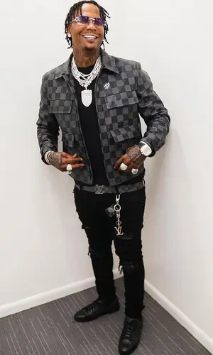 Moneybagg Yo wearing Louis Vuitton jacket