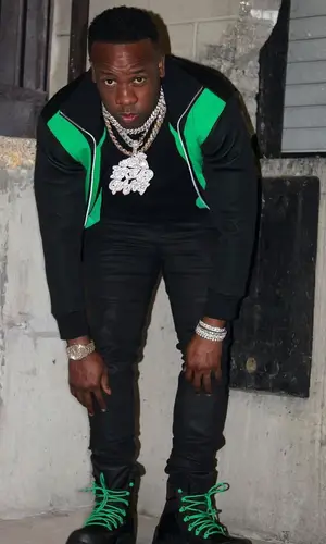 Yo Gotti wearing Bottega Veneta jacket