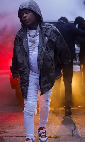 Rylo Rodriguez wearing Dior jacket