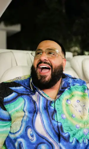 DJ Khaled wearing Gucci trousers