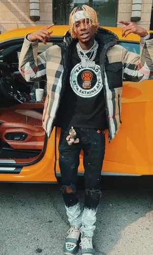 Soulja Boy wearing Louis Vuitton belt
