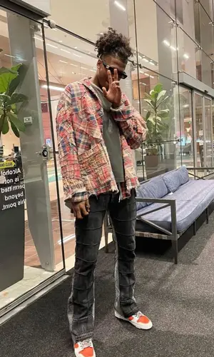 Jalen Green’s Outfit in Greg Lauren Shirt, Nike Sneakers & Gucci Eyewear (2021)
