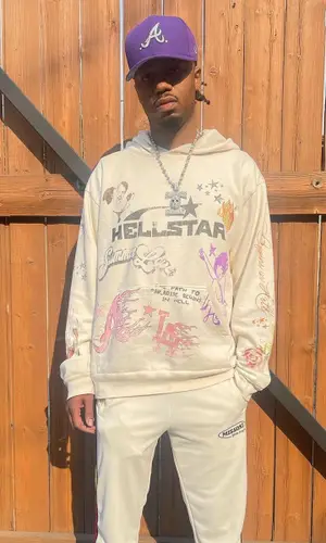 Metro Boomin wearing Palm Angels pants