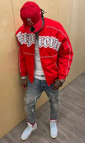 Moneybagg Yo’s Outfit in Supreme Jacket, Amiri Jeans & Jordan Sneakers (2021)