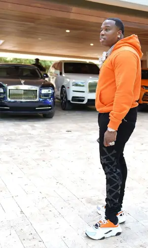 BandMan Kevo wearing Amiri jeans