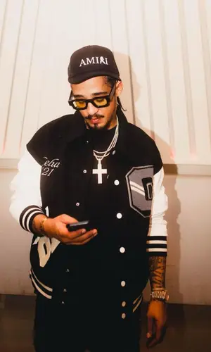 G.T. wearing Amiri cap