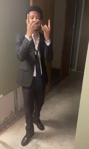 Nardo Wick wearing Dior pants
