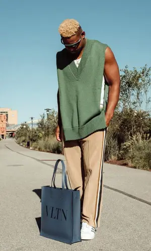 JuJu wearing Valentino bag